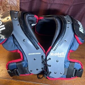 Riddell Pursuit Youth Shoulder Pads - Black, Red, and Blue